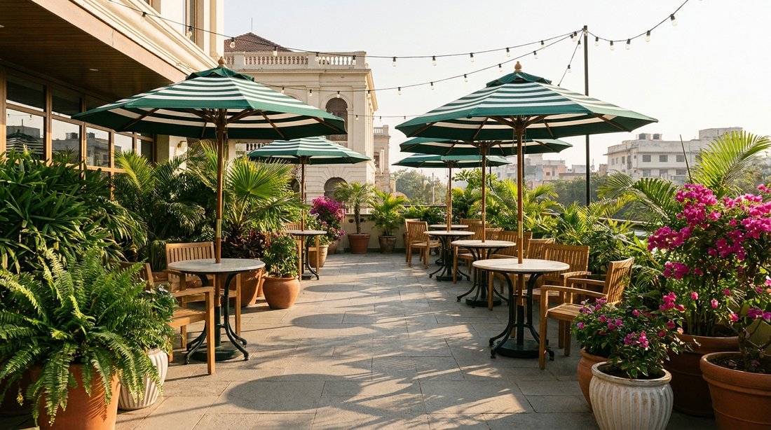 Outdoor cafe patio with branded garden umbrellas over bistro tables, an example of the umbrella specifications covered in this Sky Umbrella B2B guide