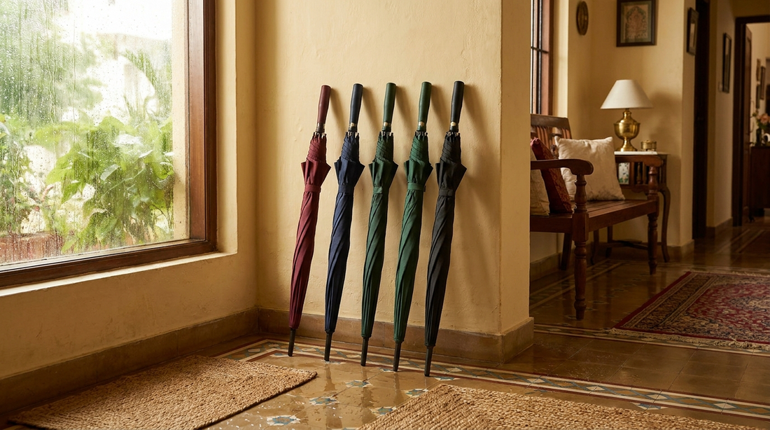 Wet umbrellas left open to air-dry near a home entrance before being stored away