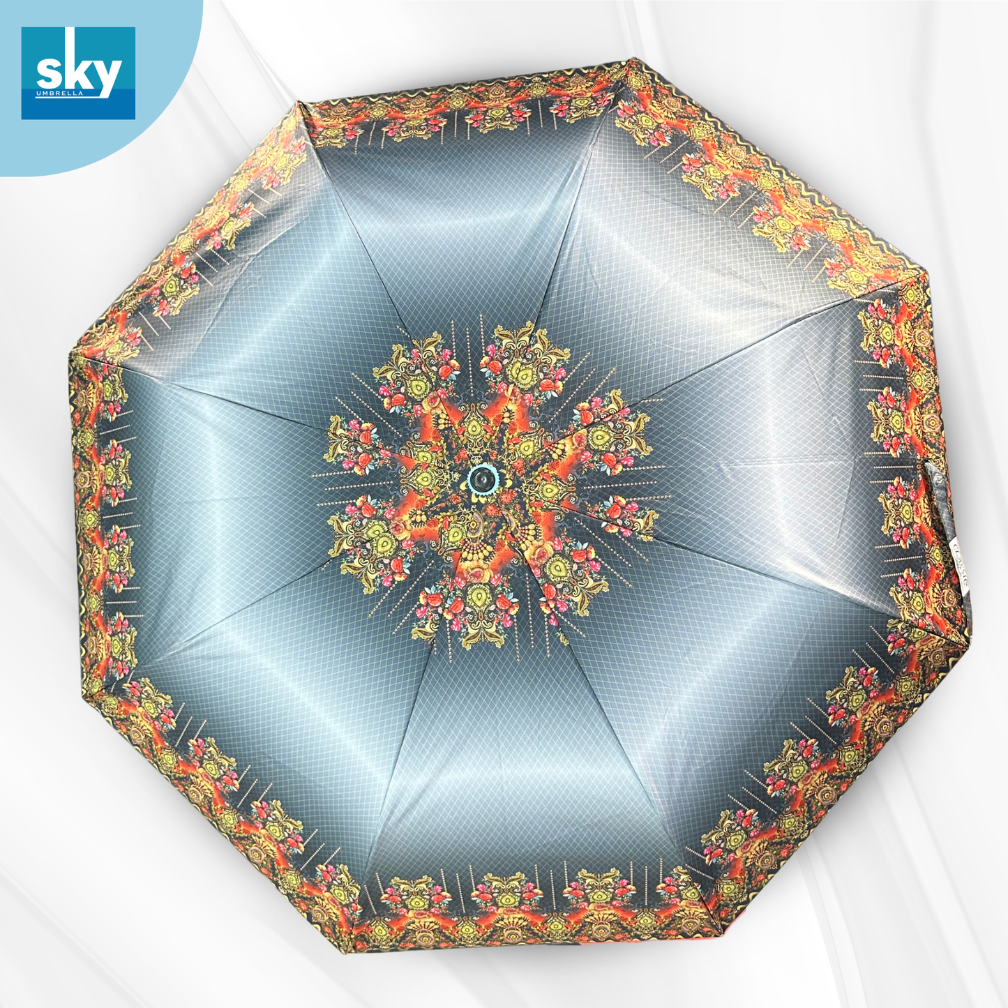 Classic Umbrella top view of Compact 3 Fold Printed Umbrella featuring grey and orange floral print with premium fabric and wind resistant Frame. 