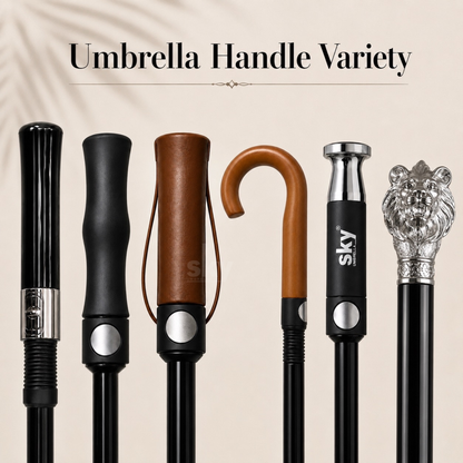 Six different umbrella handle designs are shown side by side on a light beige background with the text 'Umbrella Handle Variety' at the top. The handles include black textured and ergonomic designs, a brown leather grip with a strap, a curved brown handle, a black handle with a silver 'sky' logo, and a silver lion head handle.