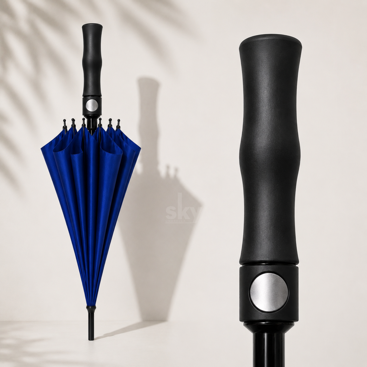 A blue folding umbrella shown open on the left and a close-up of its black handle on the right, set against a warm off-white background with soft leaf shadows.