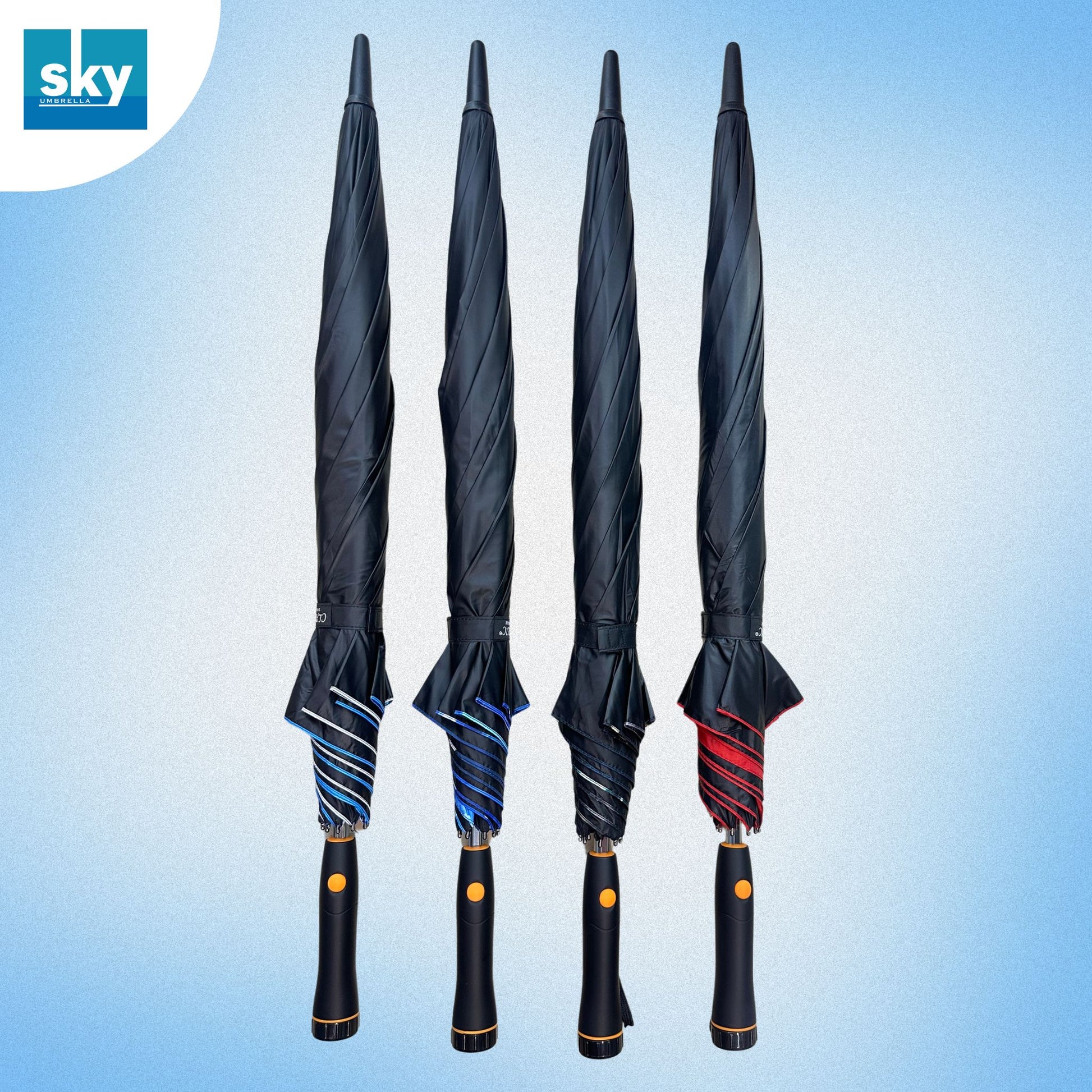 Four closed umbrellas displayed upright against a light blue gradient background. Three umbrellas are black with blue striped canopies, and one is black with a red striped canopy.