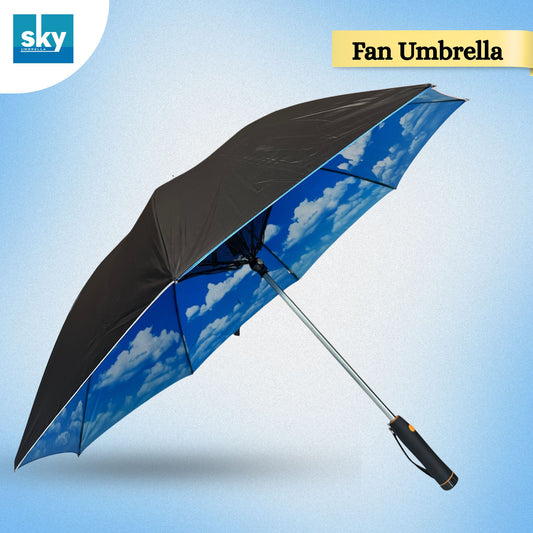 A folding fan umbrella shown open against a light blue gradient background. The underside of the canopy features a blue sky and white cloud print, while the outer canopy is black.