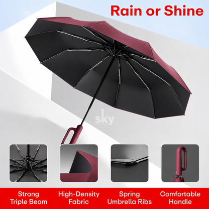 A Maroon open umbrella shown on a white geometric background with four feature callouts below: strong triple beam, high-density fabric, spring umbrella ribs and comfortable handle.