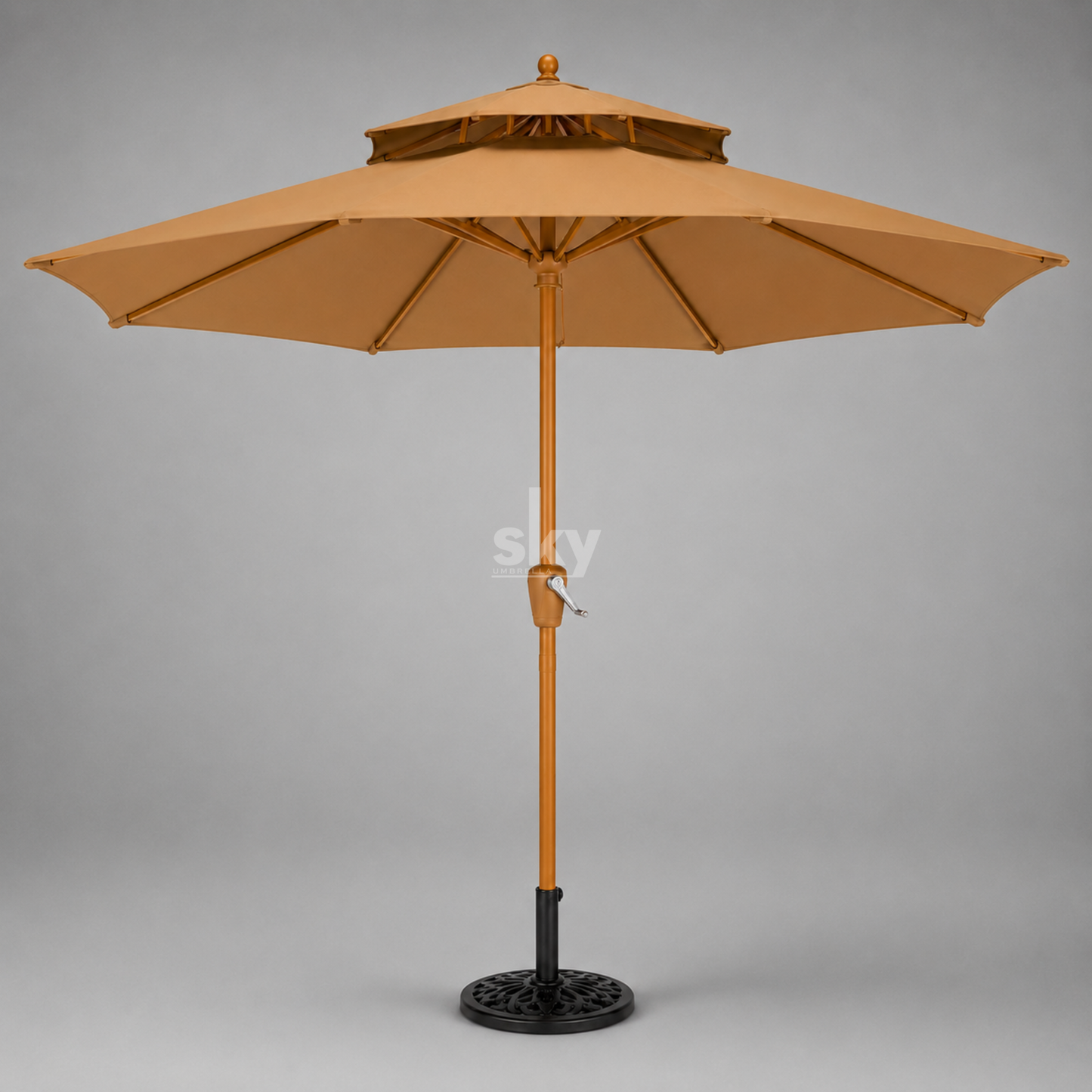 A two-tier patio umbrella with a khaki colour canopy, wooden pole finish, and black metal base, shown against a neutral gray background.